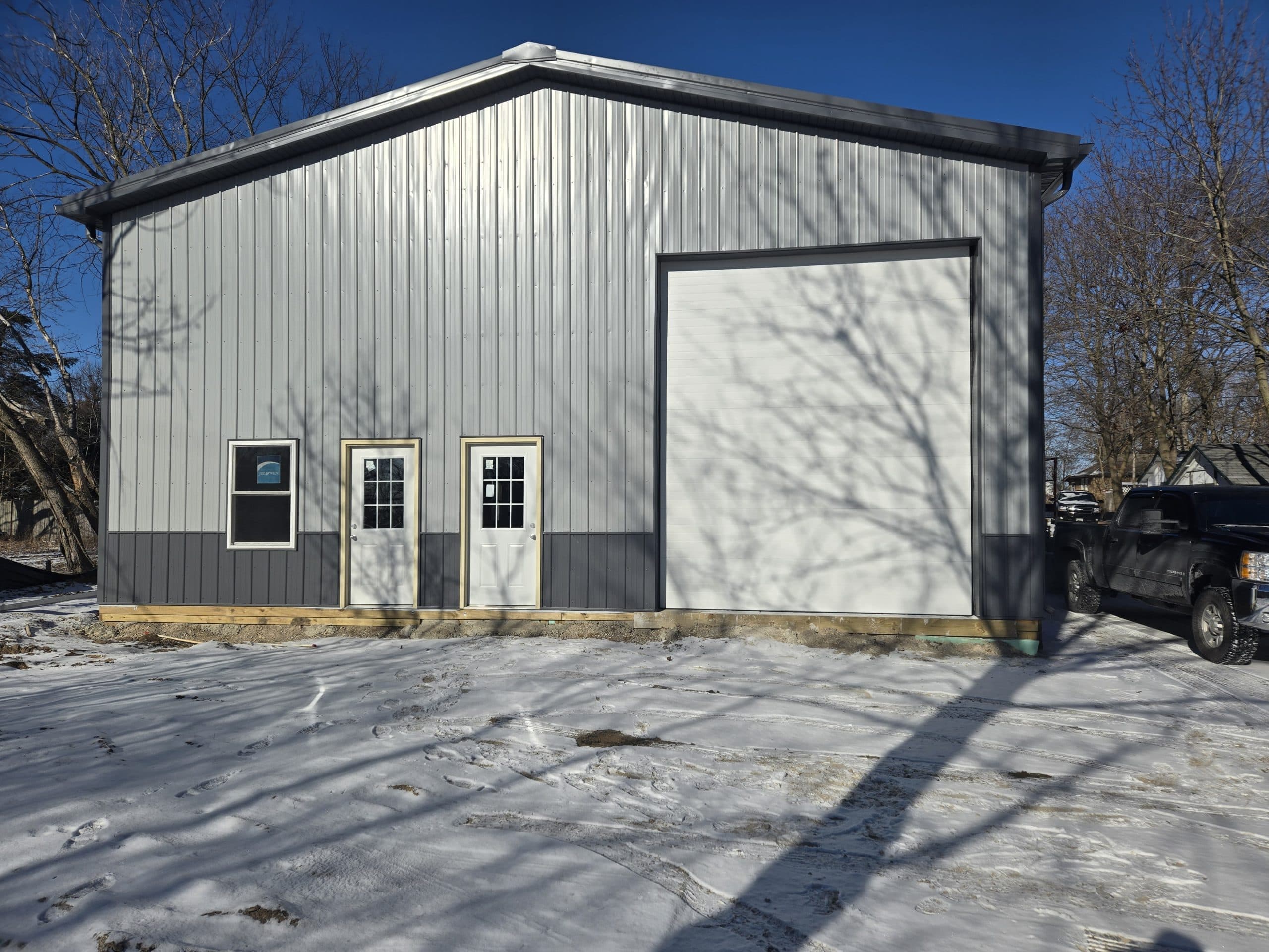 Pole barn doors with Q Garage Doors work truck